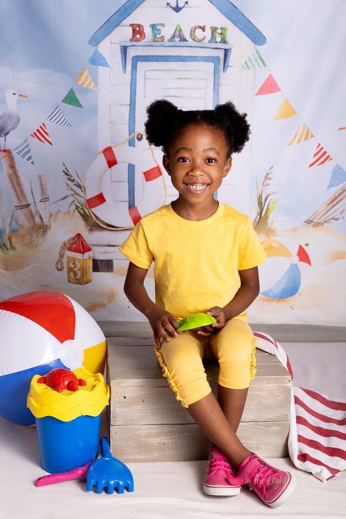 Preschool photo of a girl having fun at their annual nursery school photo day in Pretoria