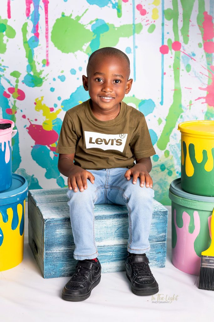 Preschool photo of a boy smiling at their annual school photo day in Sandton