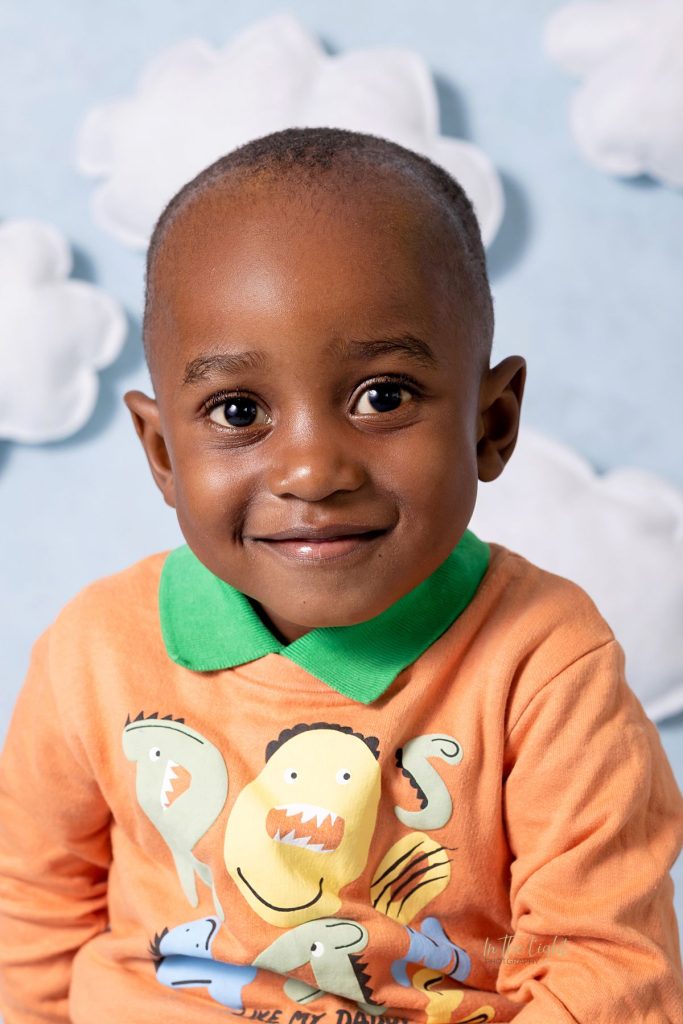Preschool photo of a boy smiling at their annual school photo day in Garsfontein, Pretoria