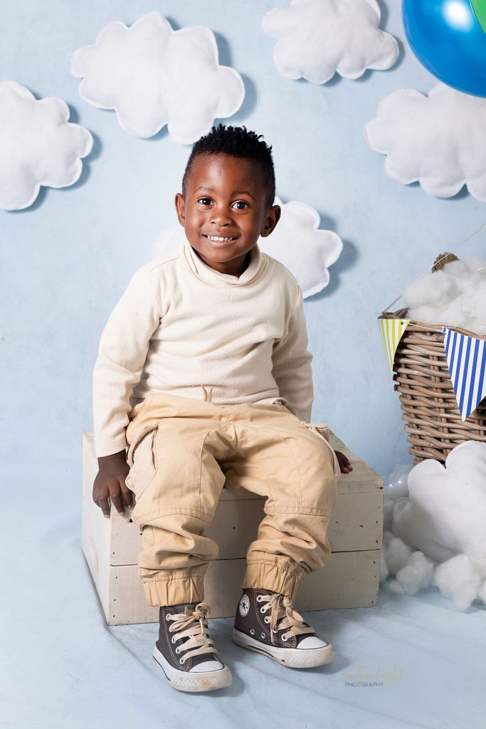 Preschool photo of a boy smiling at their annual school photo day in Garsfontein, Pretoria