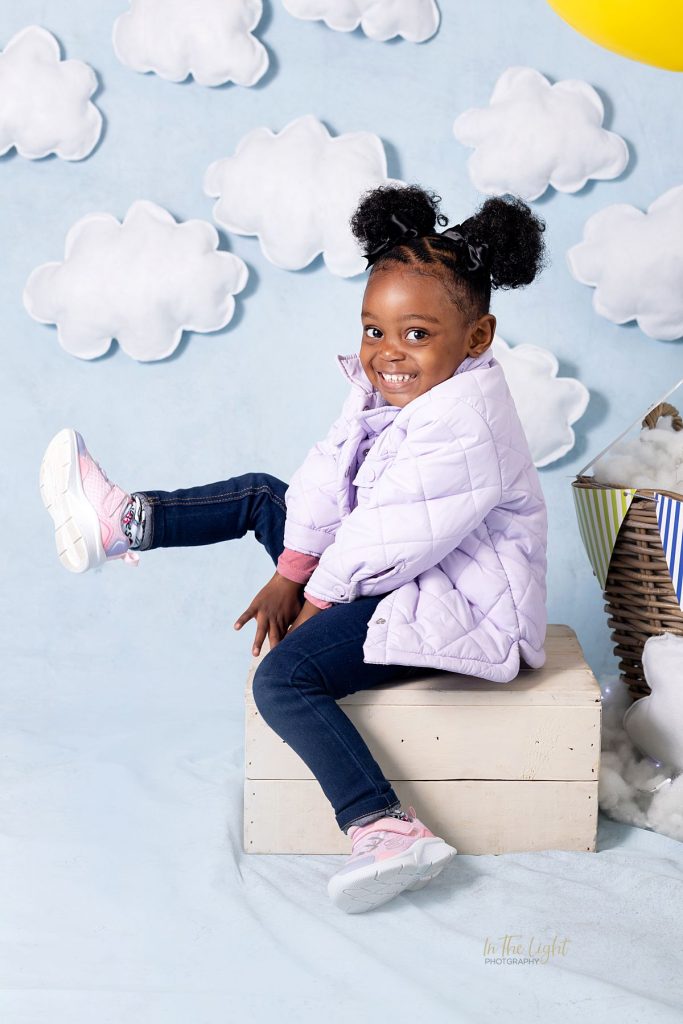 Preschool photo of a girl having fun at their annual nursery school photo day in Pretoria