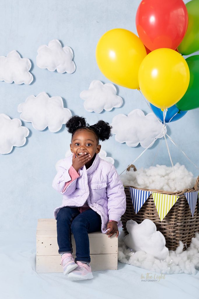 Preschool photo of a girl having fun at their annual nursery school photo day in Pretoria